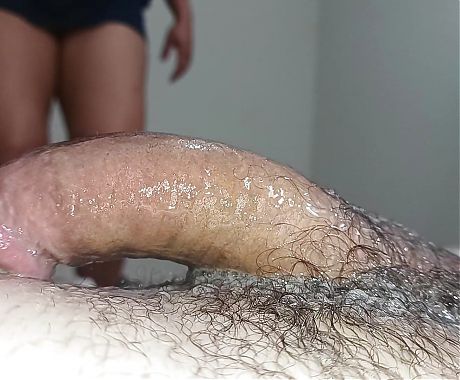 bitch masturbates a dick with a lot of spit, sliding her hands quickly into the EXTREME drool of her little mouth