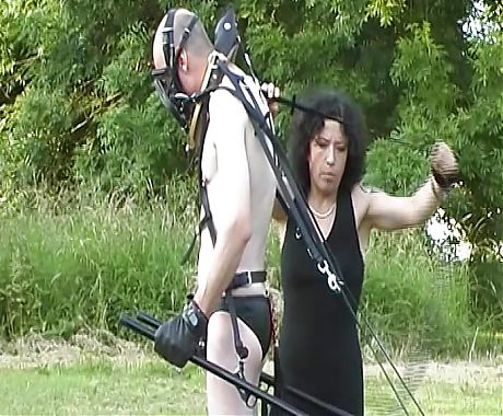 A dark haired lady from Germany making a dude worship her